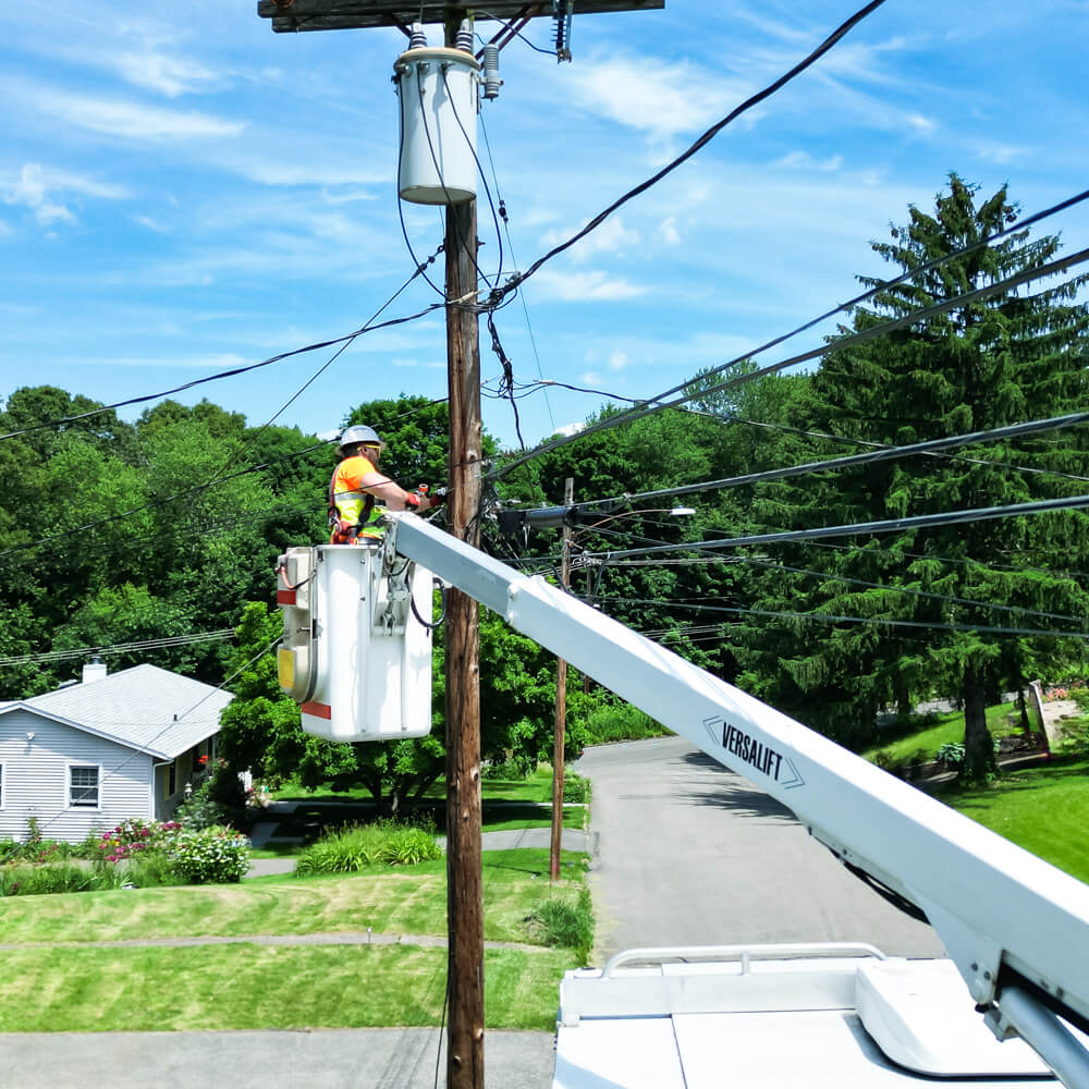 Aerial cable placement and pole setting and replacement