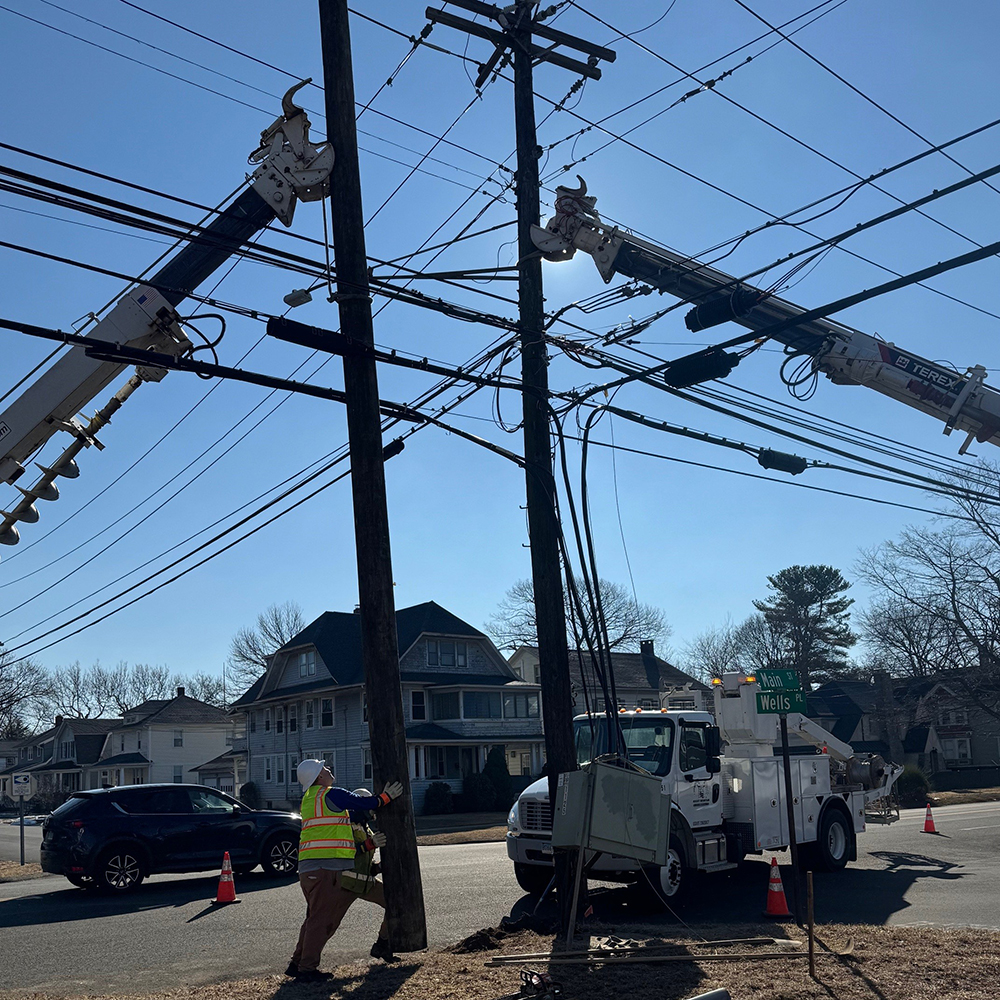 Aerial cable placement and pole setting and replacement